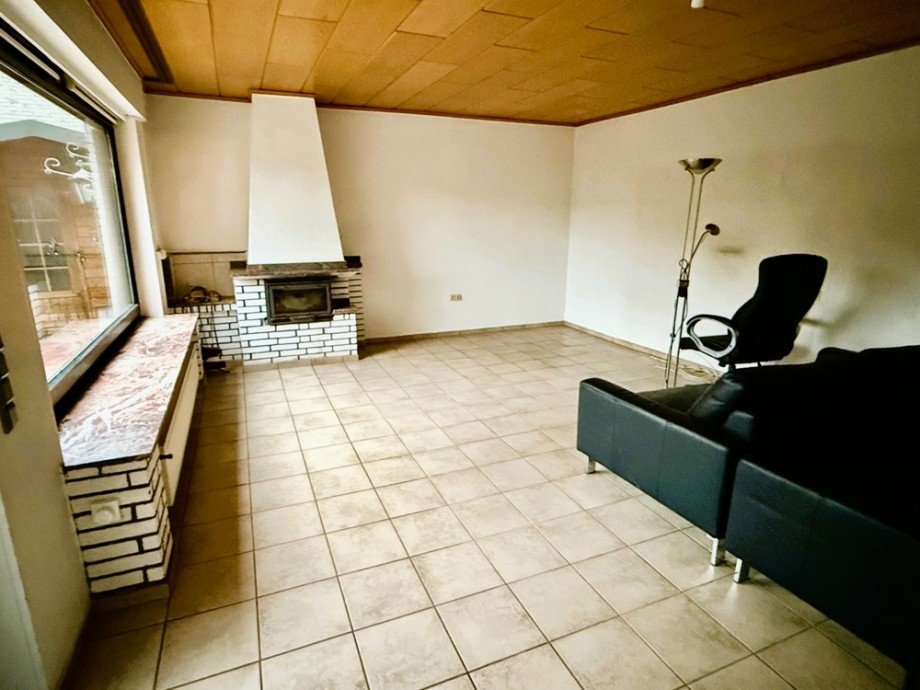 Wohnzimmer mit Kamin Einfamilienhaus Coesfeld