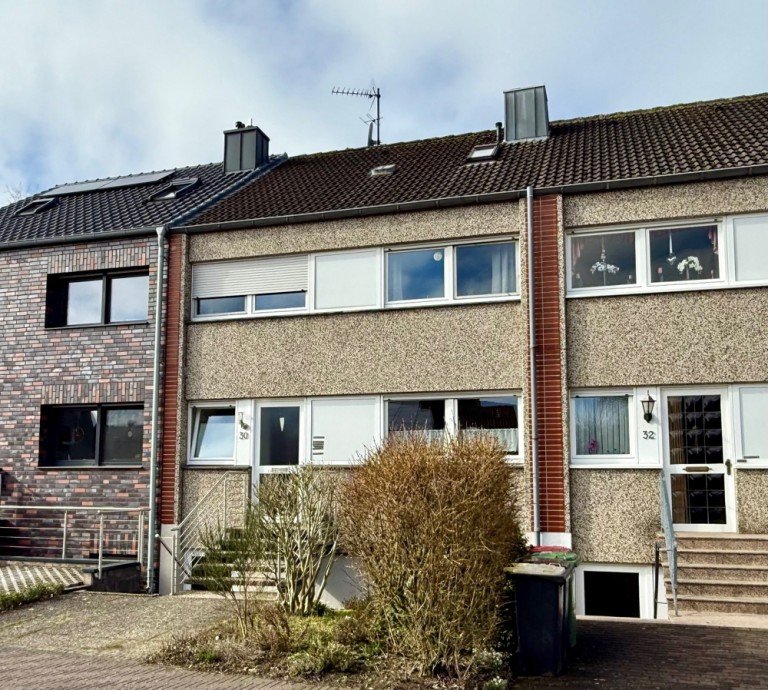 Ansicht Strasse D�lmen Reihenmittelhaus Solide und gut vermietetet !Reihenmittelhaus mit S�dgarten und Garage